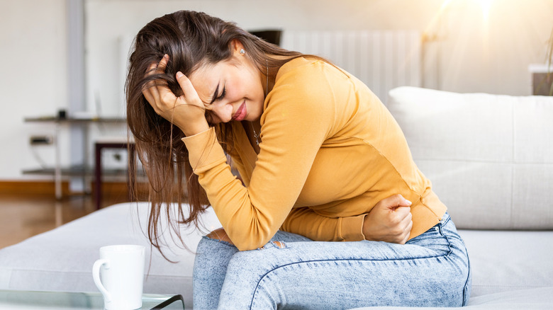 woman with stomach pain