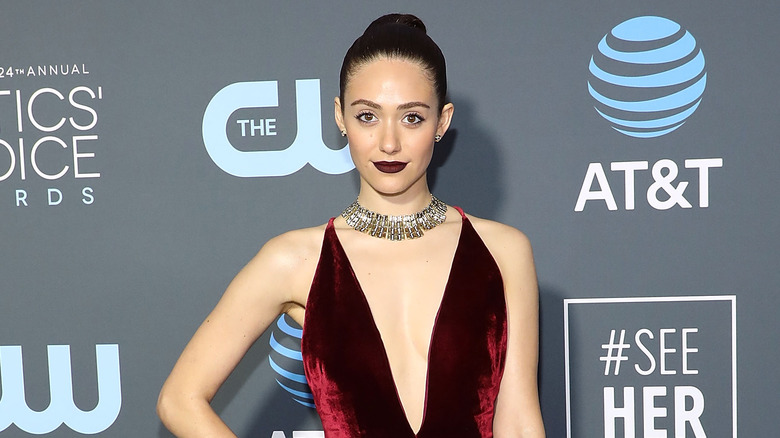 Emmy Rossum poses on the red carpet