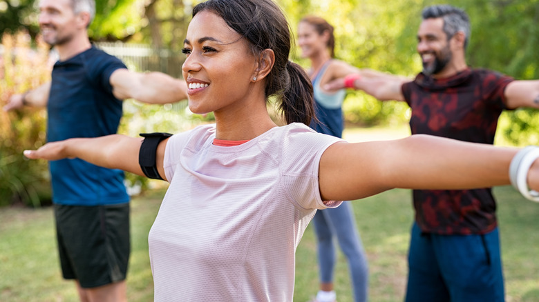 group of people working out outdoors