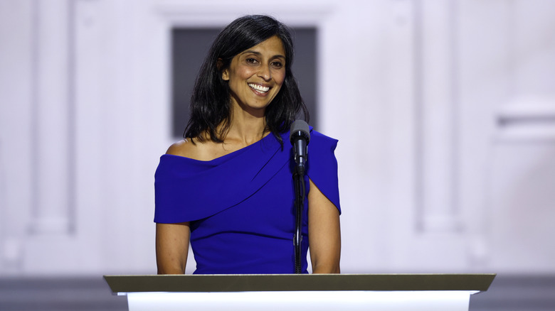 Usha Chilukuri Vance speaks on stage in blue dress