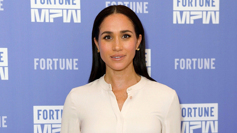 Meghan Markle smiling slightly