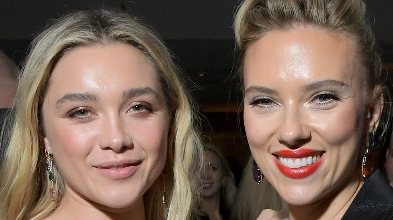 Florence Pugh and Scarlett Johansson smiling