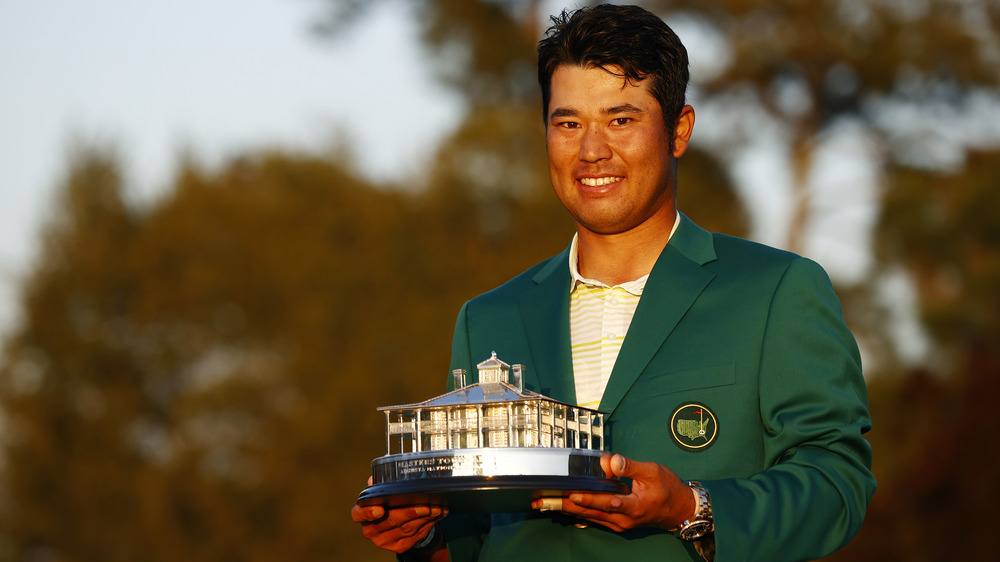 Hideki Matsuyama wears green jacket at Masters