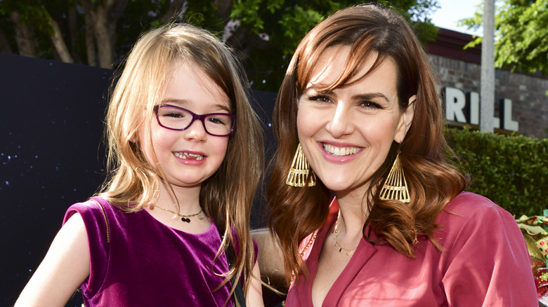 Rue Price and daughter Talulah smile for photo