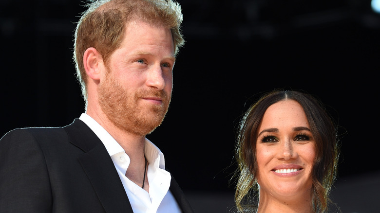 Prince Harry and Meghan Markle smiling