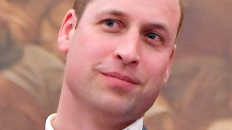 Prince William looking to the side with slight smirk