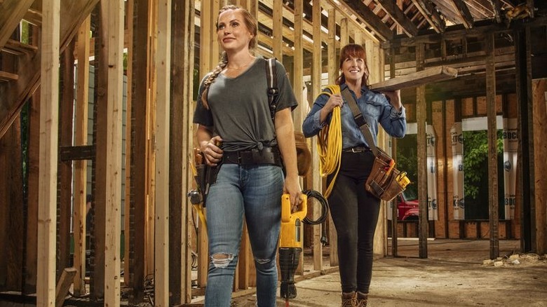 Good Bones stars Mina Starsiak Hawk and Karen Laine pose in a promotional shot for the show
