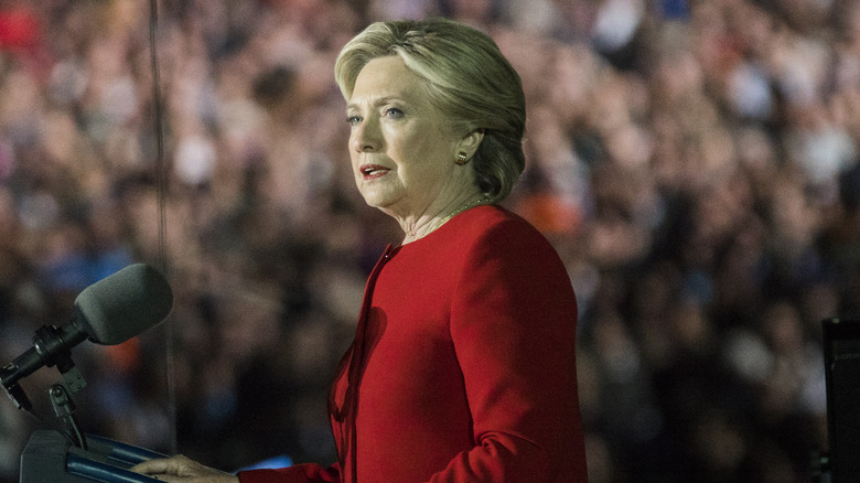 Hillary Clinton speaking at podium