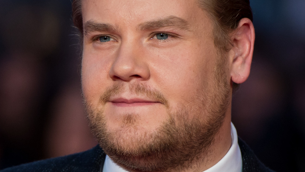 James Corden looking into distance