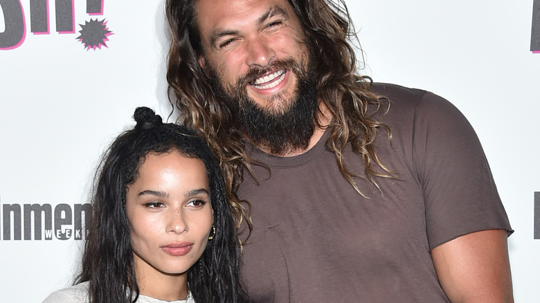 Jason Momoa posing with Zoe Kravitz