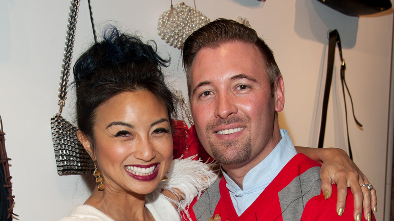 Jeannie Mai & Freddy Harteis posing 