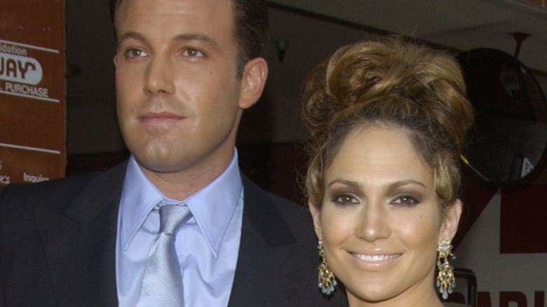 Jennifer Lopez and Ben Affleck posing on red carpet