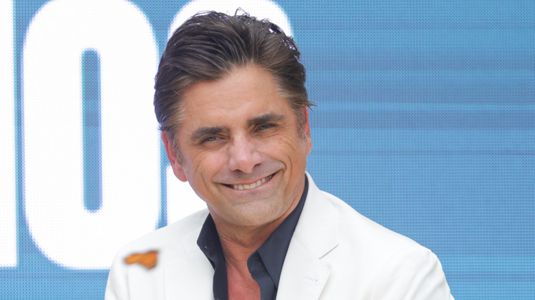 John Stamos smiling