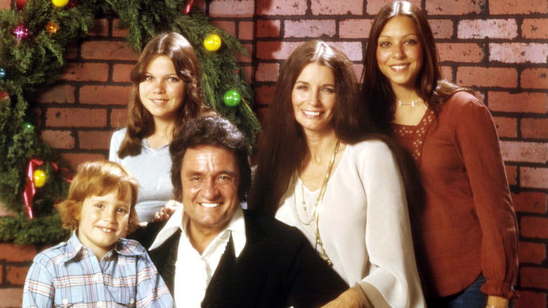 Johnny Cash, June Carter, and three of their children 