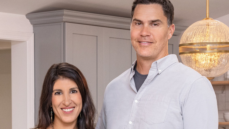 Anita Corsini and Ken Corsini posing in a kitchen