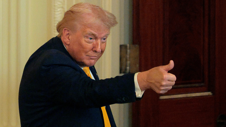 Donald Trump showing a thumbs-up