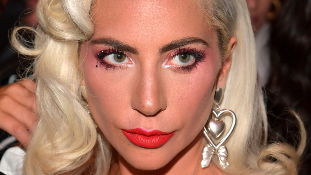 Lady Gaga wearing heart-shaped earrings