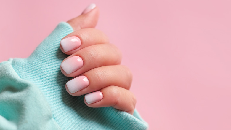 Woman wearing ombre gel nail polish 