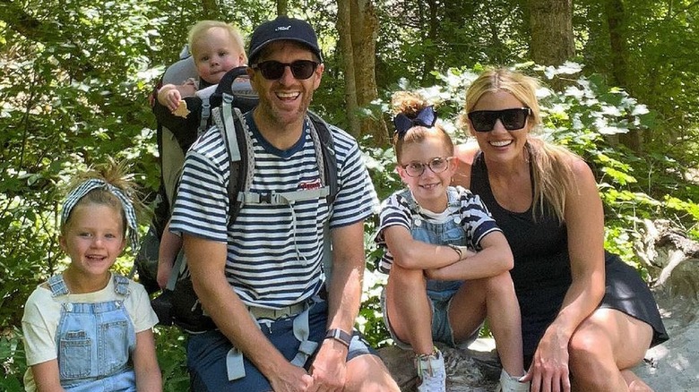Syd and Shea McGee with their three daughters on a hike