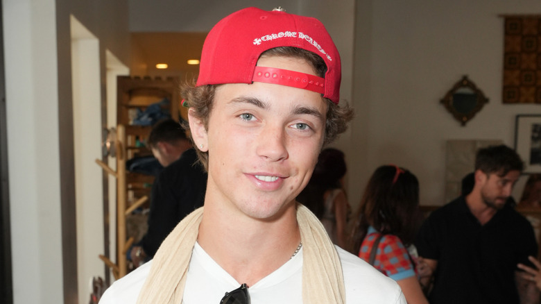 Wilder Hudson wearing a backwards hat and smiling