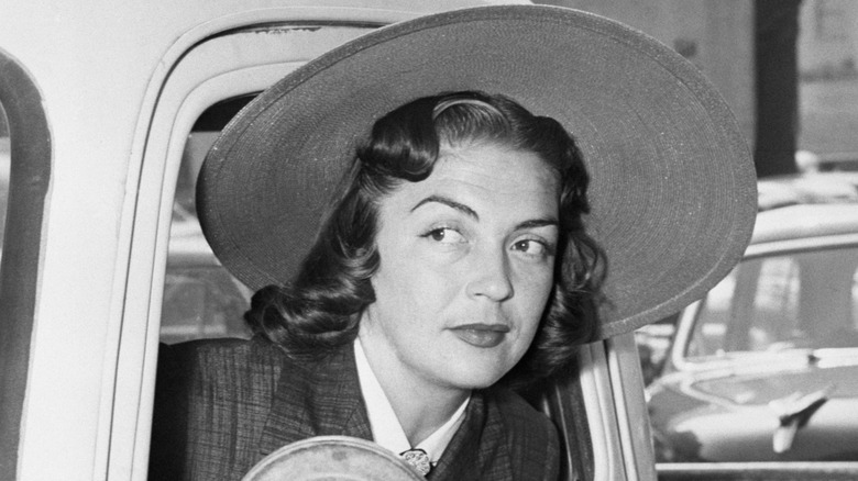 Esperanza Baur wearing a wide-brimmed hat