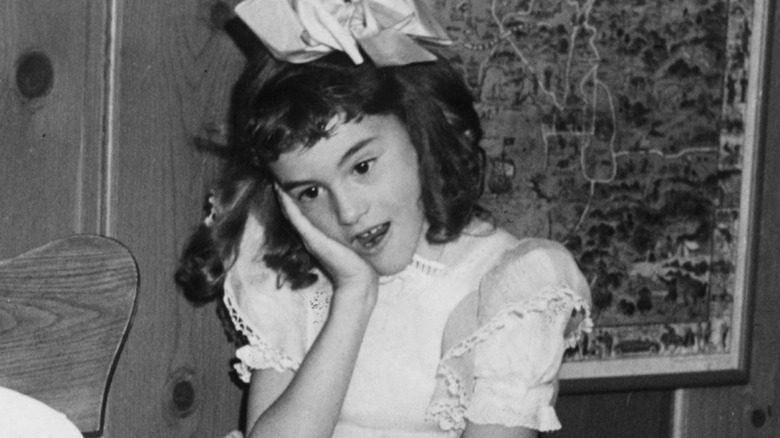 Toni Wayne La Cava wearing a large bow