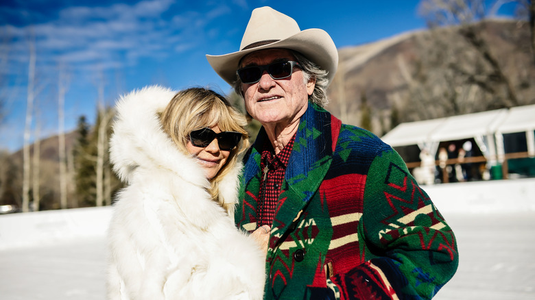 Goldie Hawn and Kurt Russell posing at the St. Regis World Snow Polo Championships 2025 at Rio Grande Park on December 18, 2025 in Aspen, Colorado.