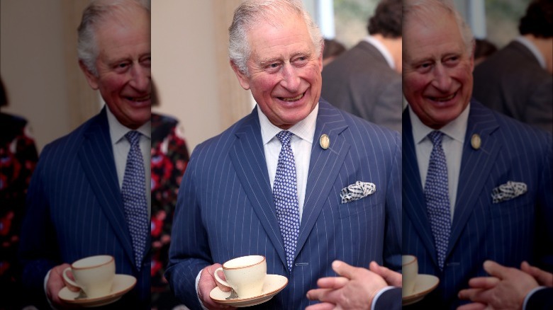 Prince Charles drinking tea