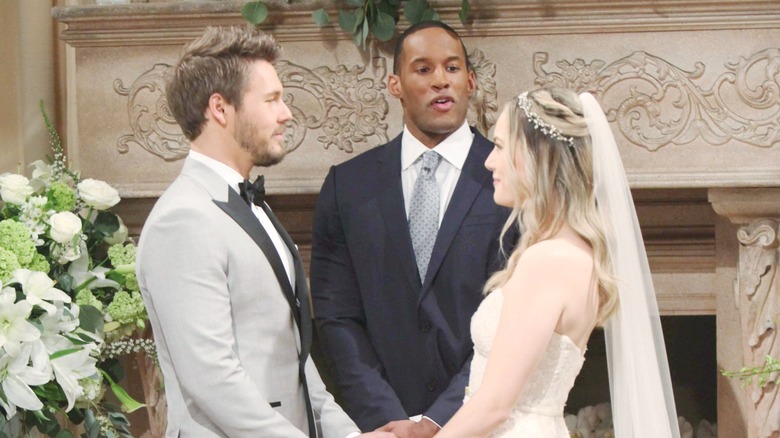 Lawrence Saint-Victor marrying Scott Clifton and Annika Noelle in a scene