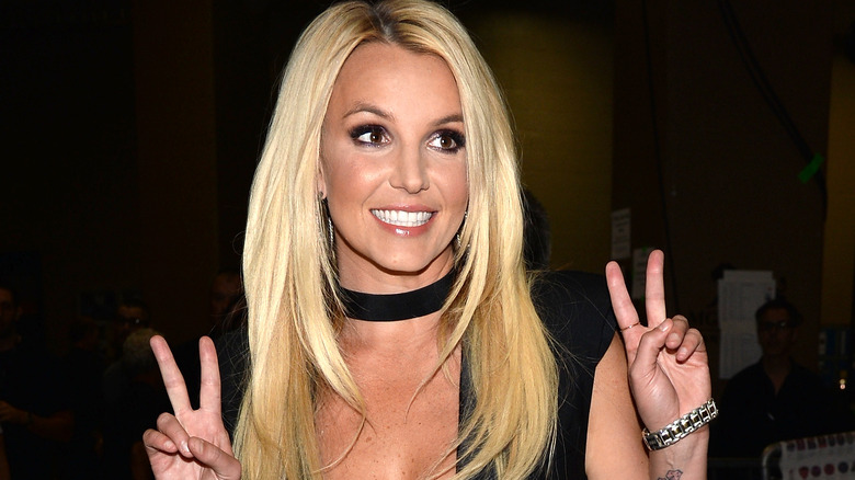 Britney Spears making peace signs