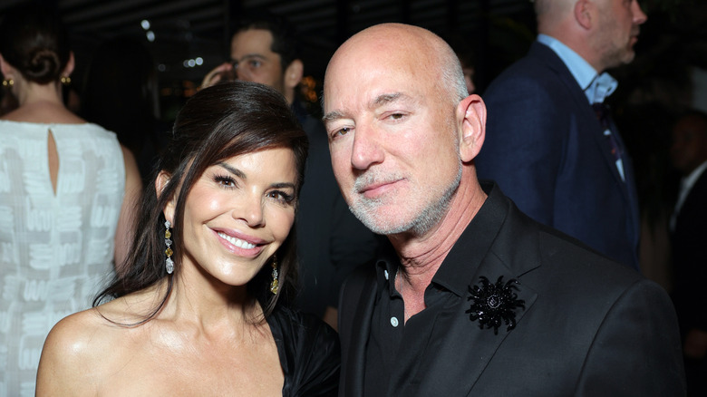 Lauren Sánchez Bezos smiling while posing with Jeff Bezos