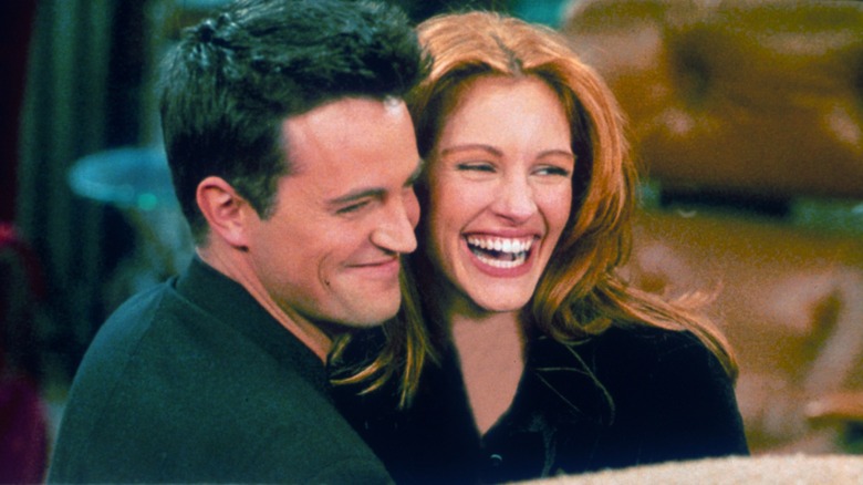 Matthew Perry smiling with Julia Roberts
