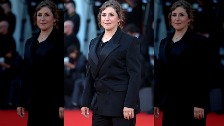 Mayim Bialik in a black suit