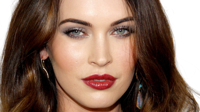Megan Fox staring with red lips
