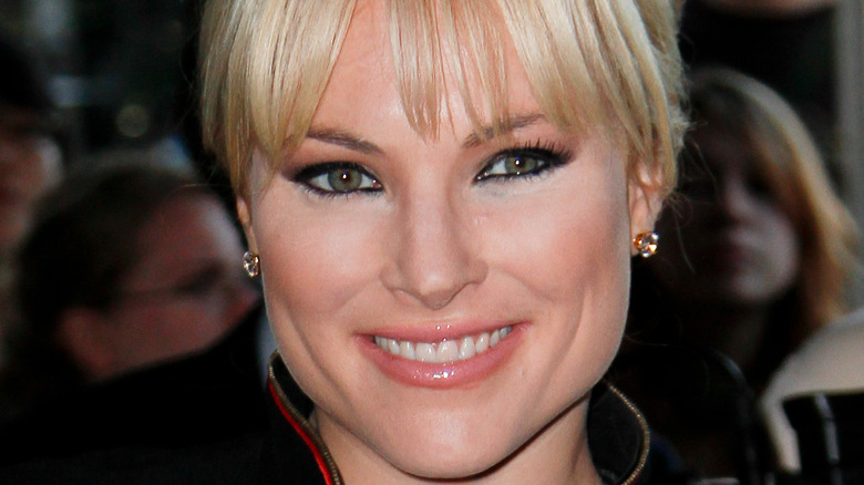 Meghan McCain smiling with bangs