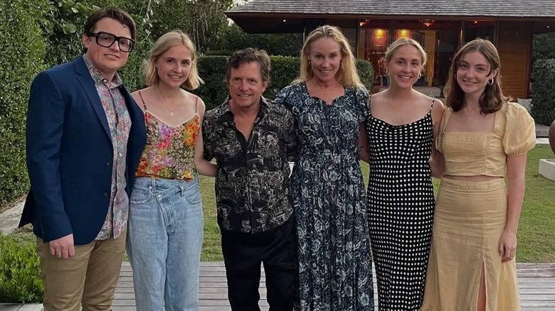 Michael J. Fox and Tracy Pollan pose with their children