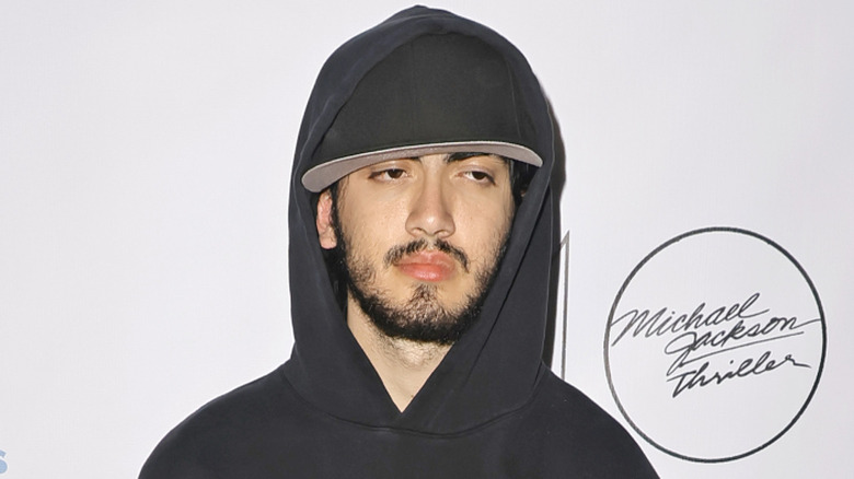 Prince Michael "Bigi" Jackson II, formerly Blanket Jackson, wearing a baseball cap and hoodie