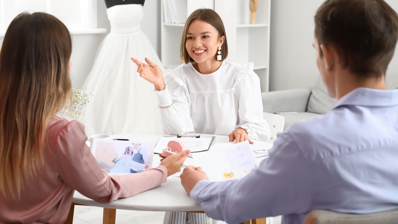 wedding planner discussing details 