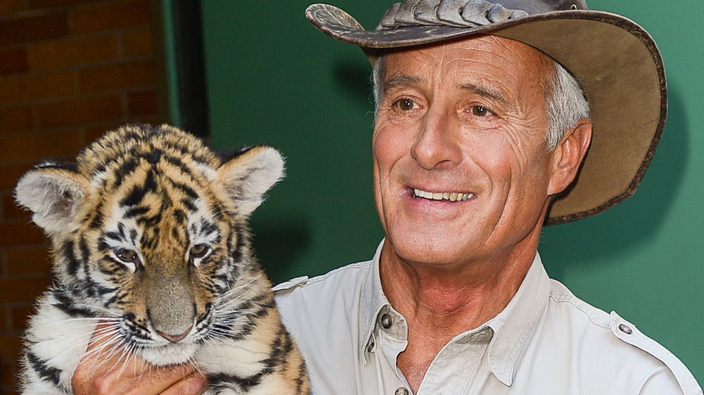 Jack Hanna holding a tiger cub