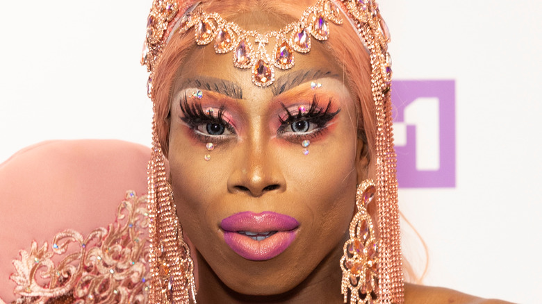 Monique Heart in a pink glam look