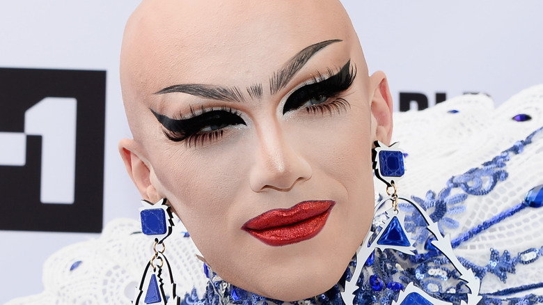 Sasha Velour poses on the red carpet