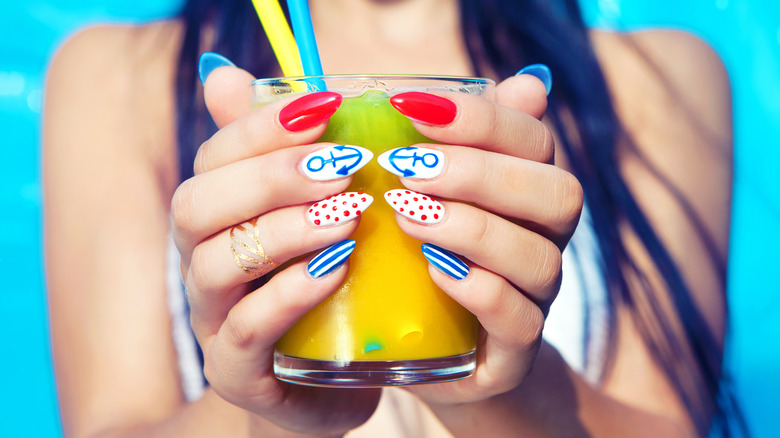 Woman with nail stickers