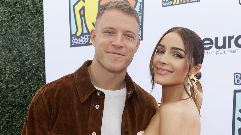 Christian McCaffery and Olivia Culpo on the red carpet