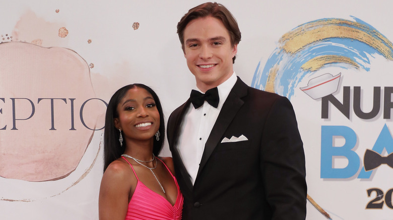 Tabyana Ali and Nicholas Chavez smiling