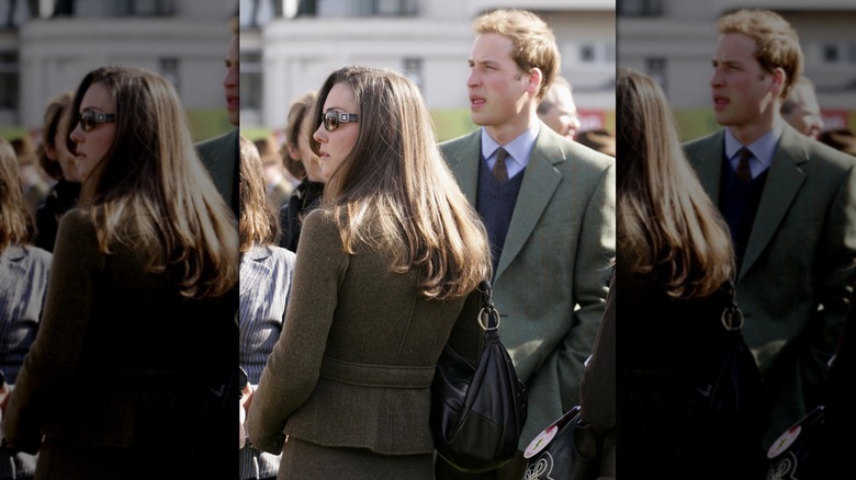 Prince William and Kate Middleton looking off into the distance at Cheltenham Racecourse