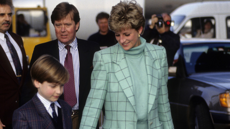 Diana walks with William at the airport 