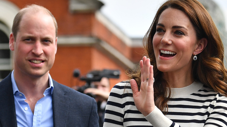 The Prince and Princess of Wales greet fans