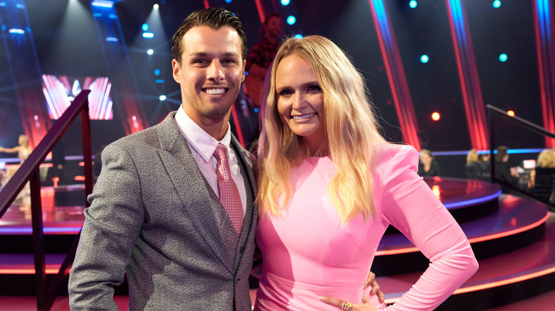 Brendan McLoughlin and Miranda Lambert pose next to each other