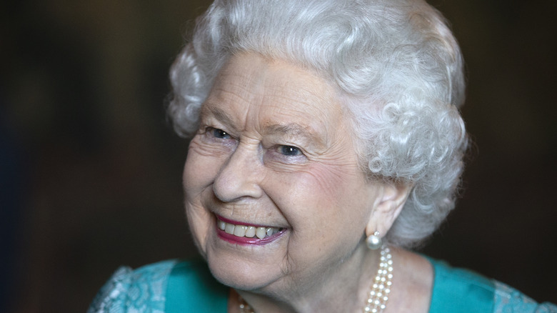 Queen Elizabeth grinning