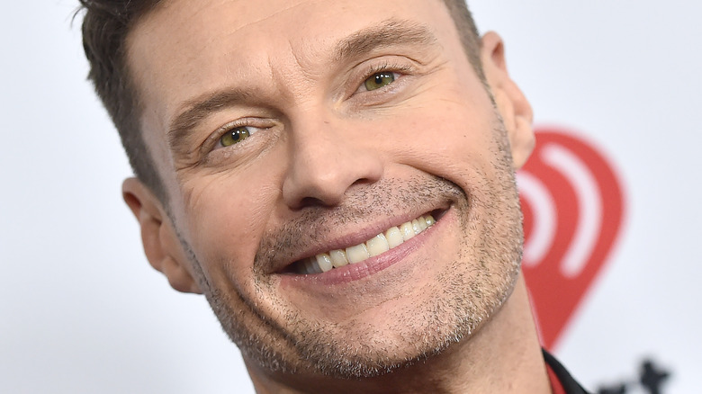 Ryan Seacrest smiles